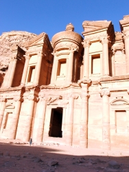 The massive facade of the Monastery in Petra
